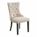 Sedia da pranzo in tessuto beige con gambe in legno